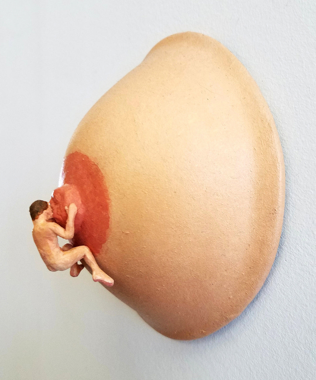 Tiny Man Kissing